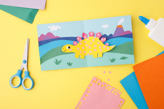 Dinosaur paper craft greeting card for kids education primary school creative hobby activity pre-school learning material kindergarten art project teaching resource childcare service stationary brand.