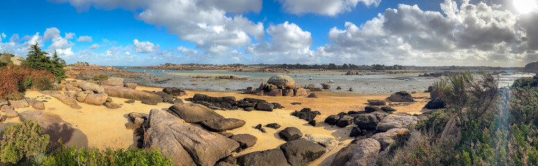 Beach and tidal pools near in Tregastel, Brittany, France. Panoramic view