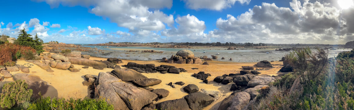 Beach and tidal pools near in Tregastel, Brittany, France. Panoramic view