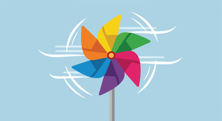 Obraz premium A colorful toy pinwheel spinning rapidly in the wind against a pale blue sky