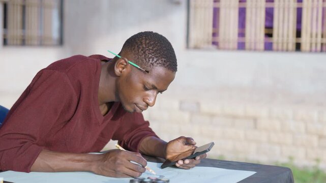 Black painting study outdoors, frustrated artist checking smartphone reference while sketching on paper, maroon sweater, pencil behind ear, courtyard wall and window backdrop, expressive hands, tense