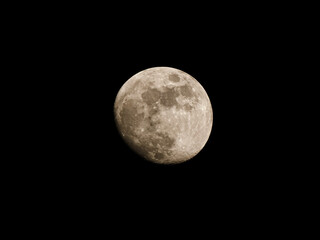 Obraz premium Close up of almost full moon with visible craters in the lower side is the orbit. Places and space photography. Front side of the moon. 