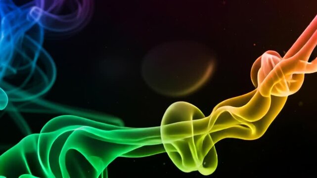 Vibrant rainbow smoke swirls against a dark background in a mesmerizing display.