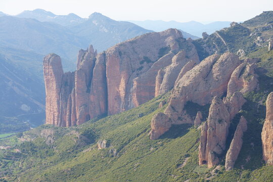 Mallos de Riglos rock formations in Huesca, Spain with dramatic cliffs and blue sky