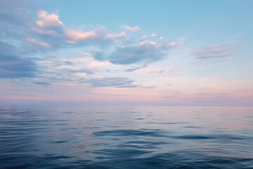 Obraz premium Wide Ocean View with Distant Cloud Formations on the Horizon