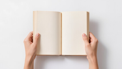 Obraz premium Hands Holding Blank Open Book Pages on White Background