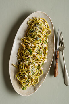 Plate of spaghetti with pesto.