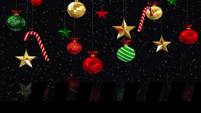 Animation of christmas decorations and snow falling over winter scenery