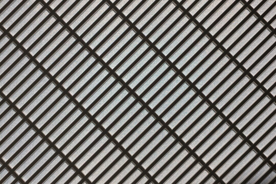 Diagonal grid pattern creating abstract architectural background texture