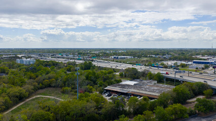 Obraz premium Aerial shot of cars driving on the highway in Jacksonville Florida USA