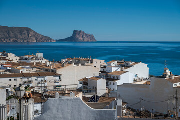 Fototapeta premium Panoramic view of Altea white houses and Mediterranean Sea with Peñon de Ifach on the horizon, Costa Blanca, Alicante, Spain.