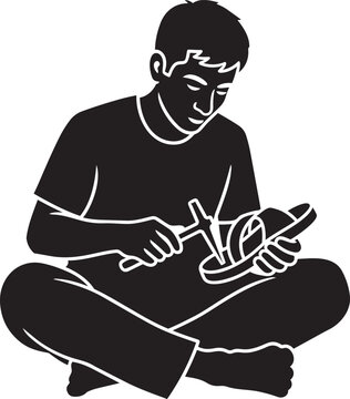 Black silhouette of a man sitting crosslegged whittling wood