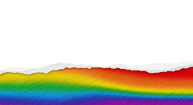 Torn paper revealing a vibrant rainbow spectrum of colors on a white background.