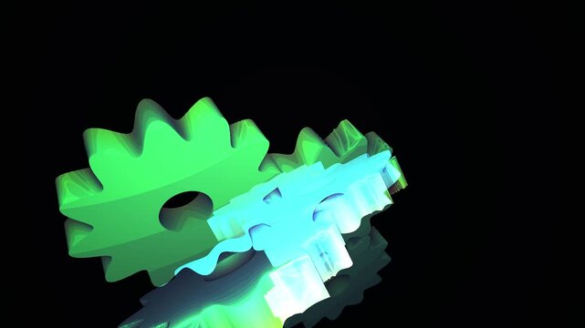 Close-up of interlocking green and blue metal gears on a black background with a reflective surface.