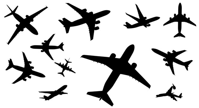 Collection of various airplane silhouettes in different flight positions.