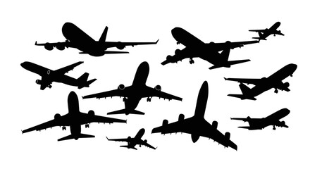 Collection of various airplane silhouettes in different flight positions, isolated on a white background, perfect for aviation and travel themes. © Gina