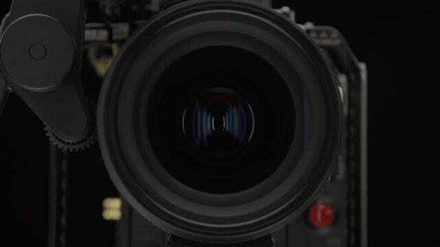 Dolly zoom into cinema camera lens