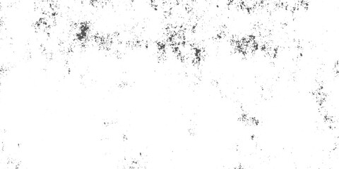 Obraz premium Grunge dust scattered black dirt speckles and stains on white background, distressed vintage paper effect, minimal monochrome grunge overlay, high contrast, realistic grain texture.