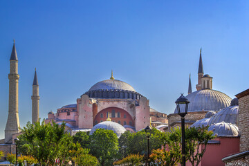 Hagia Sophia Mosque view from Sultanahmet Square in Istanbul, Turkey. Byzantine architecture with domes under sunny blue sky © borisb17