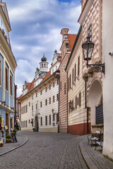 Fototapeta premium Historical building on Horni street in Cesky Krumlov, Czechia. Renaissance architecture with sgraffito under cloudy sky