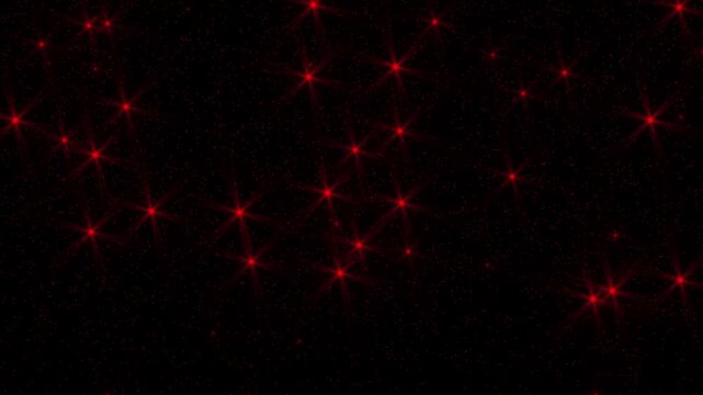 Red twinkle stars and light rays explode and float in space