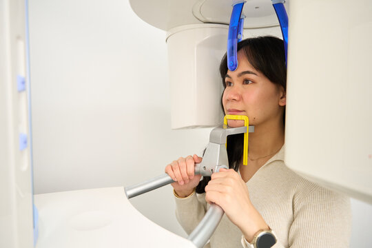 Woman getting dental cbct scan for diagnostics