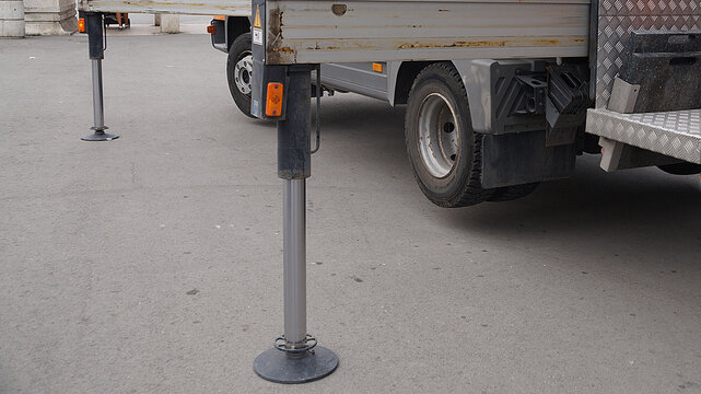 fire truck hydraulic stabilizer platform on city street