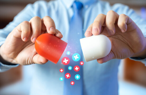 A man breaks open a medical capsule to analyze contents. Drug quality and safety become critical concerns. Evidence-based medicine ensures trust and transparency in pharmaceuticals.