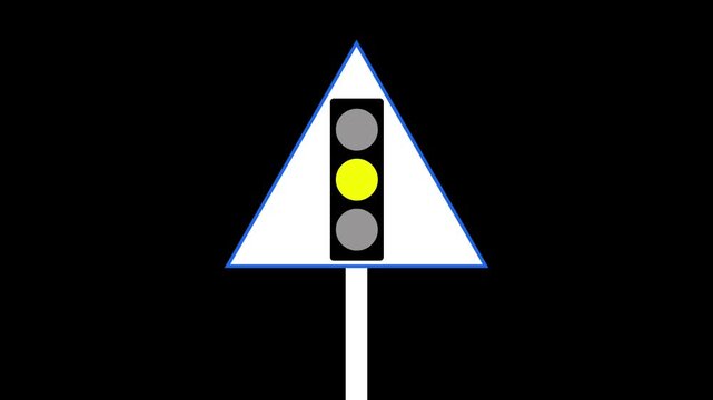 The bottom yellow light is illuminated on this traffic signal while a yellow ready sign is visible on the right side. 4k videos,,,,,,,..