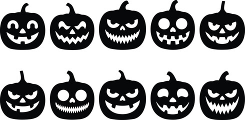 Obraz premium Jack o lanterns with various carved faces silhouettes 