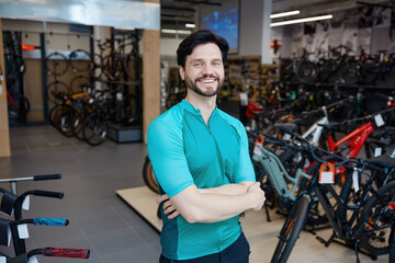 Confident bicycle retailer radiates friendliness amidst well-stocked urban cycling © Nomad_Soul