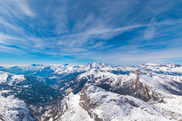 Fototapeta premium Aerial View of Snow Covered Alpine Peaks in the Italian Dolomites