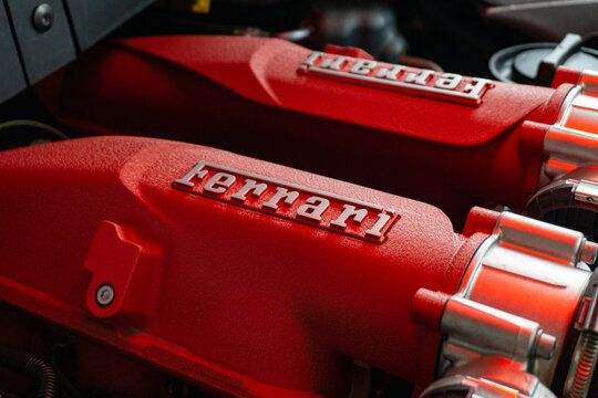 Ferrari Portofino red engine intake manifold close up, High performance sports car motor bading closeup