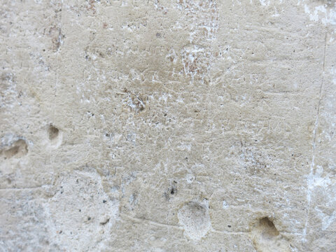 wall of the ancient Russian Transfiguration Cathedral in Pereslavl-Zalessky with an ancient inscription about the murder of Andrei Bogolyubov