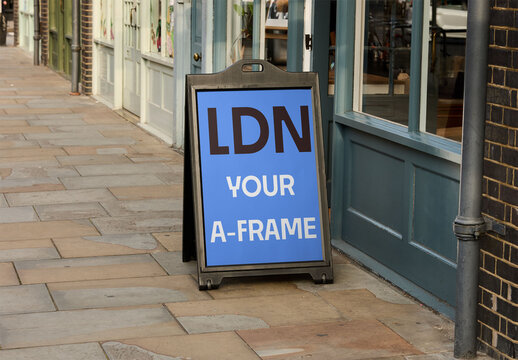 Mockup A-frame sidewalk Sign Outside Shop in London UK