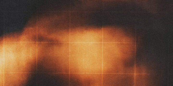 A pixelated image of a yellow and brown object on a dark background