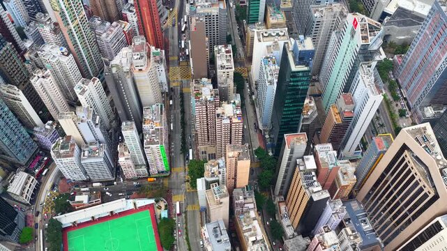 Aerial drone skyview of Hong Kong Victoria Harbour Financial CBD hub Central Admiralty Wan Chai Happy Valley Wong Nai Chung Stadium Tai Hang Causeway Bay Tai Hang
