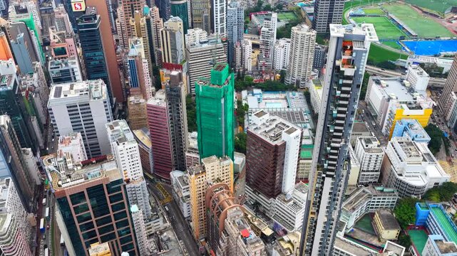 Aerial drone skyview of Hong Kong Victoria Harbour Financial CBD hub Central Admiralty Wan Chai Happy Valley Wong Nai Chung Stadium Tai Hang Causeway Bay Tai Hang