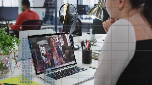 Watching woman in business-casual vest resting chin on hands at office, laptop charts, copy space