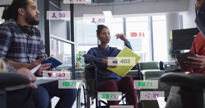Woman in wheelchair leading marketing team speaking gesturing, causing social badges flooding frame