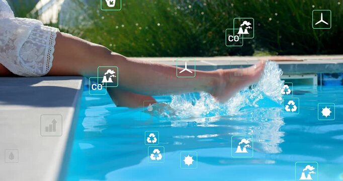 Woman dipping then kicking poolside, creating ripples animating eco icons visualizing climate data