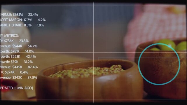 Displaying three wooden bowls, central olive bowl, soft HUD on wood table showing cyan marker