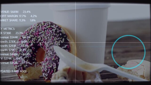 Showing chocolate donut leaning against white cup on dark table, animating analytics UI with spoon