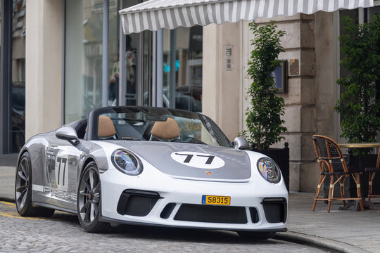 Nancy, France - September 1st 2019 : View on a grey Porsche 991 Speedster Heritage Package finished in GT Silver and white parked on a street.