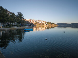 Fototapeta premium Panorama of Lake Orestiada around town of Kastoria, Greece