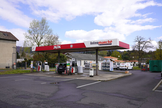 THIERS, FRANCE - MARCH 31, 2026: Intermarche self-service gas station with 24/24 signage and fuel pumps
