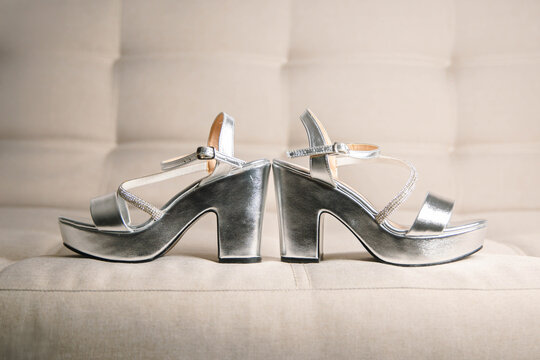 Elegant bridal shoes in metallic tones, perfect for a modern wedding look.