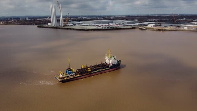 Trailing suction hopper dredger on the river Hull.