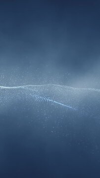 Wavy dotted particles forming a glowing line over blue mystic smoke light. Soft volumetric atmosphere with smooth motion creates futuristic abstract background. Vertical seamless looping.