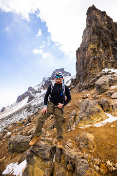 Hiker enjoying mountain adventure in scenic landscape